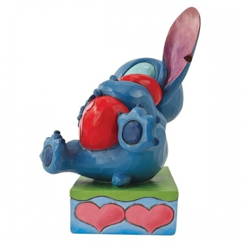 Disney Traditions Stitch Hugging a Heart Figurine