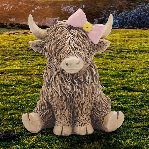 Highland Cow with Pink Hair bow Sitting Ornament Figurine